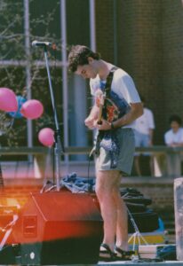 Craig Hordlow playing guitar in Electric Soup